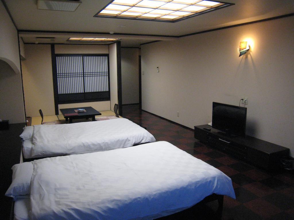 Отель Utsumionsen Ichizu Aichi Экстерьер фото